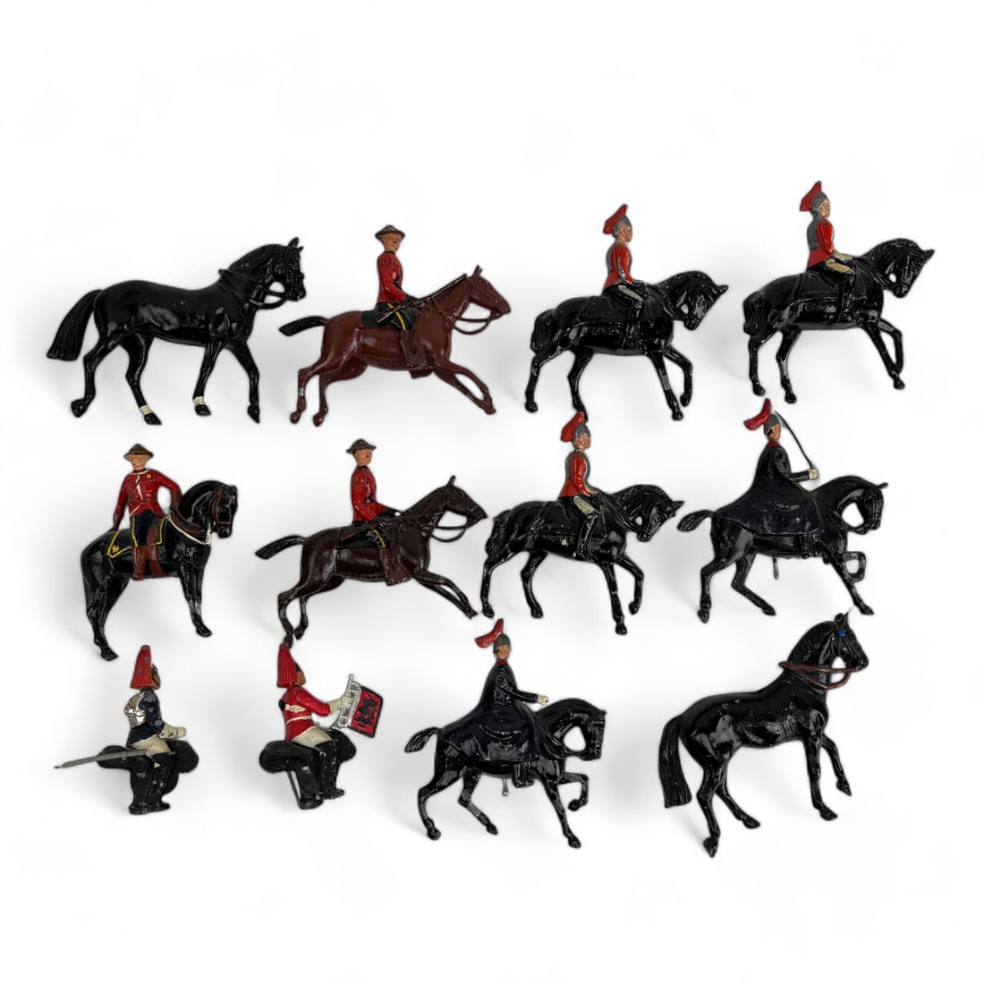 Royal Canadian Mounted Police Mini Toy Soldiers: Estate collection lot of a total of ten (10) toy soldiers representing The Royal Canadian Mounted Police. Features a variety of figures, all intricately painted and mounted on horseback, showcasing a 