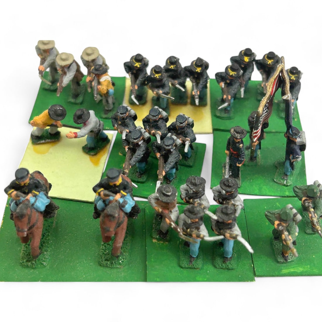 Extensive Collection Civil War Miniature Figurines: Meticulously hand crafted collection of Civil War era miniature figurines, featuring both Union and Confederate forces engaged in various battle scenes. This set includes a variety of figures, soldier