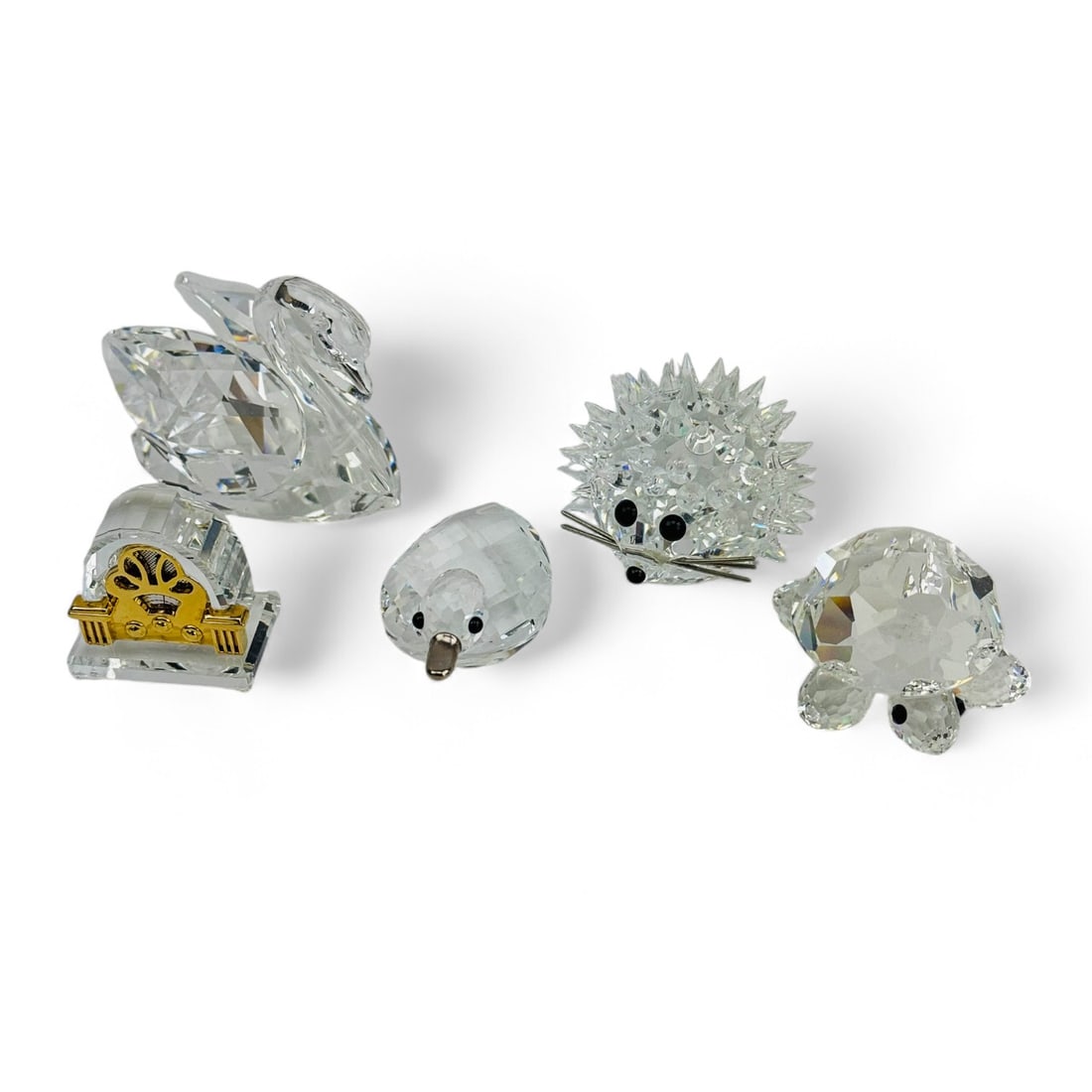 Lot of 5 Swarovski Duck Swan Radio Turtle Figurine: This collection includes 5 Swarovski Minifigures including Duck, Swan, Radio, Turtle and Porcupine. Each figurine is crafted from clear Swarovski Crystal with fine detailing. All Stamped with Swarovsk