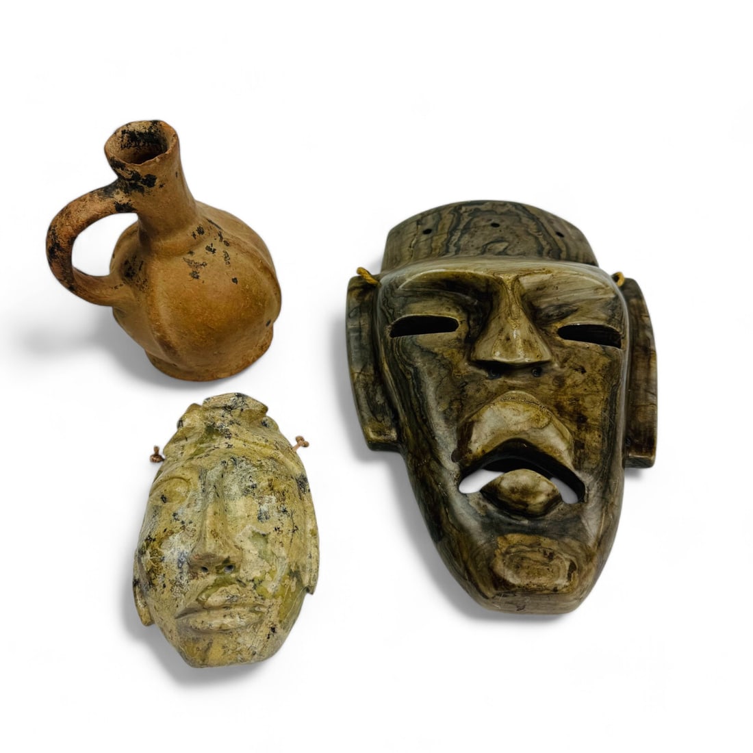 Pre Columbian Style Stone Mask & Pottery Jug 3pc: Lot features a total of three Pre Columbian style Mayan, Aztec, Veracruz inspired artifacts and decorative objects. Includes ~ a carved and polished natural stone mask face with open mouth and cut out