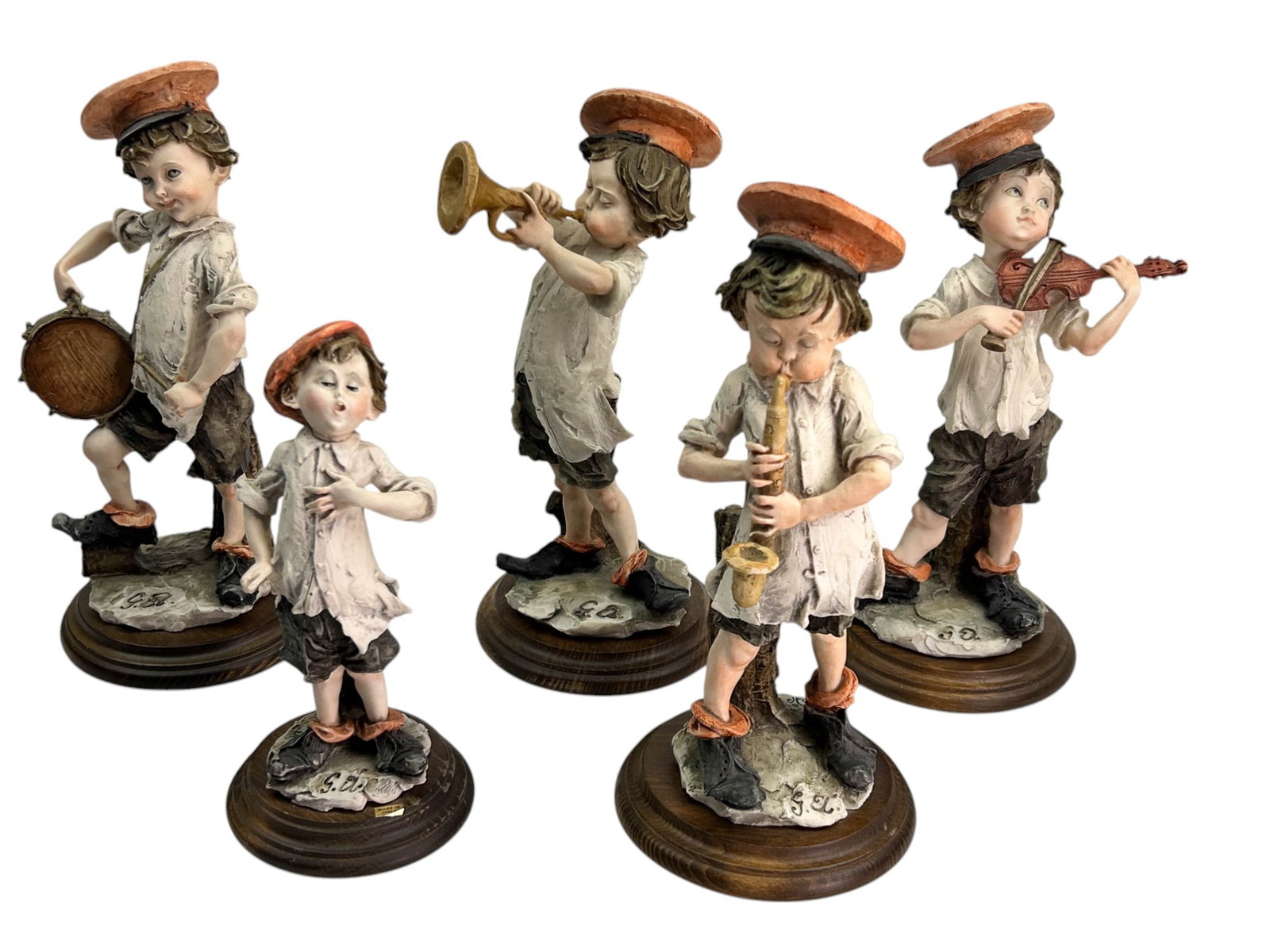 Giuseppe Armani Style Child Musician Figurines 5pc: A estate collection lot of a total of five (5) hand painted composition figurines in the style of Giuseppe Armani (Italian, 1935 - 2006). Each depicting a child musician playing various instruments in
