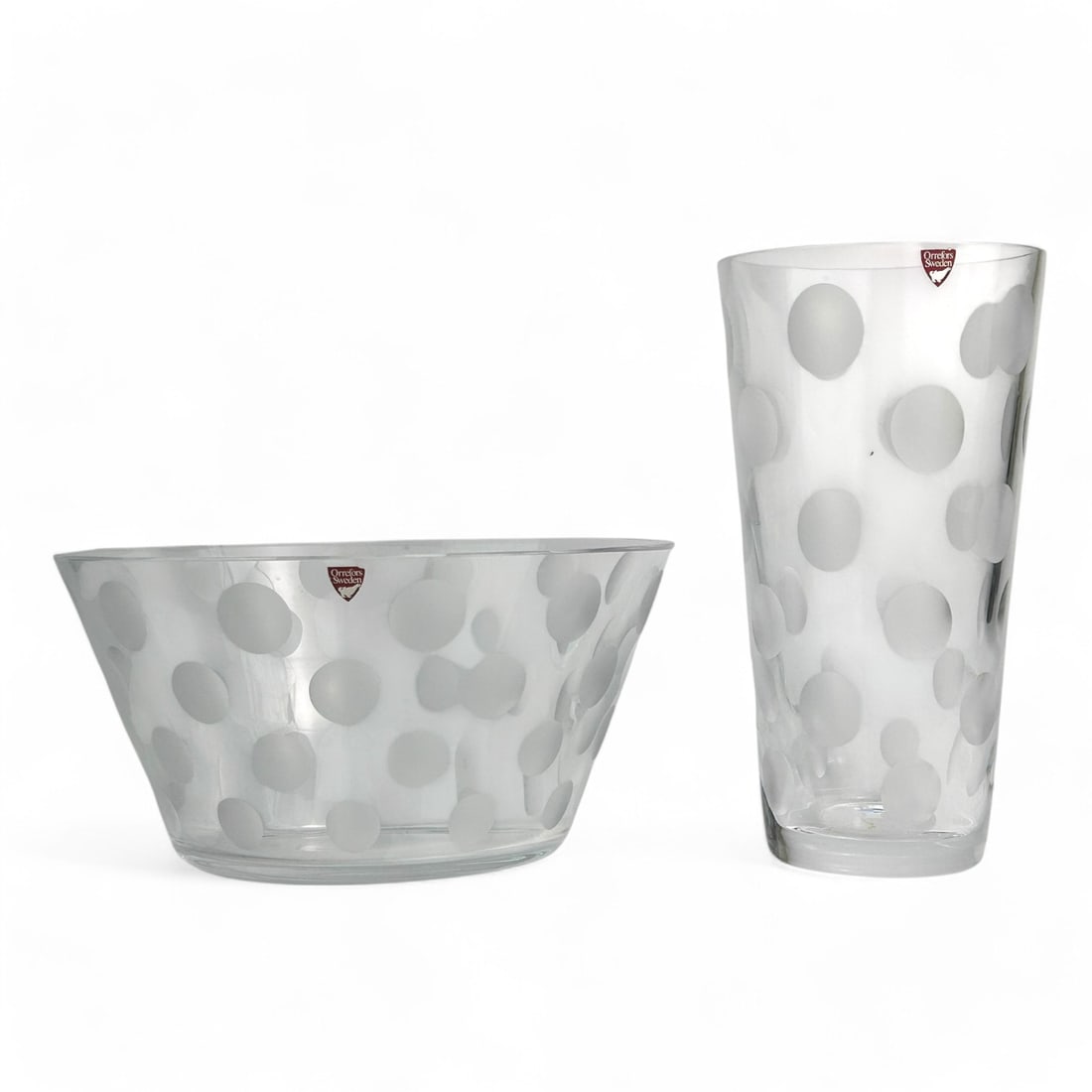 Orrefors Anne Nilsson Polka Dot Glass Vase & Bowl: Anne Nilsson (Swedish, born 1953) studio hand crafted crystal art glass bowl and vase. Both feature an iconic "Polka Dot" pattern. Includes a tall vase and a wide bowl, both showcasing frosted and cle