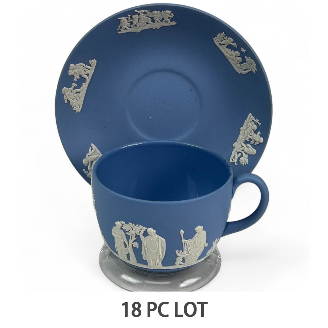 Wedgwood Blue Jasperware Tea Cups Saucers 18pc LOT: A collection lot of nine tea cups and nine matching saucers (total of eighteen pieces) by Wedgwood England in Blue Jasperware. All featuring the iconic neoclassical design in white relief of mythologi
