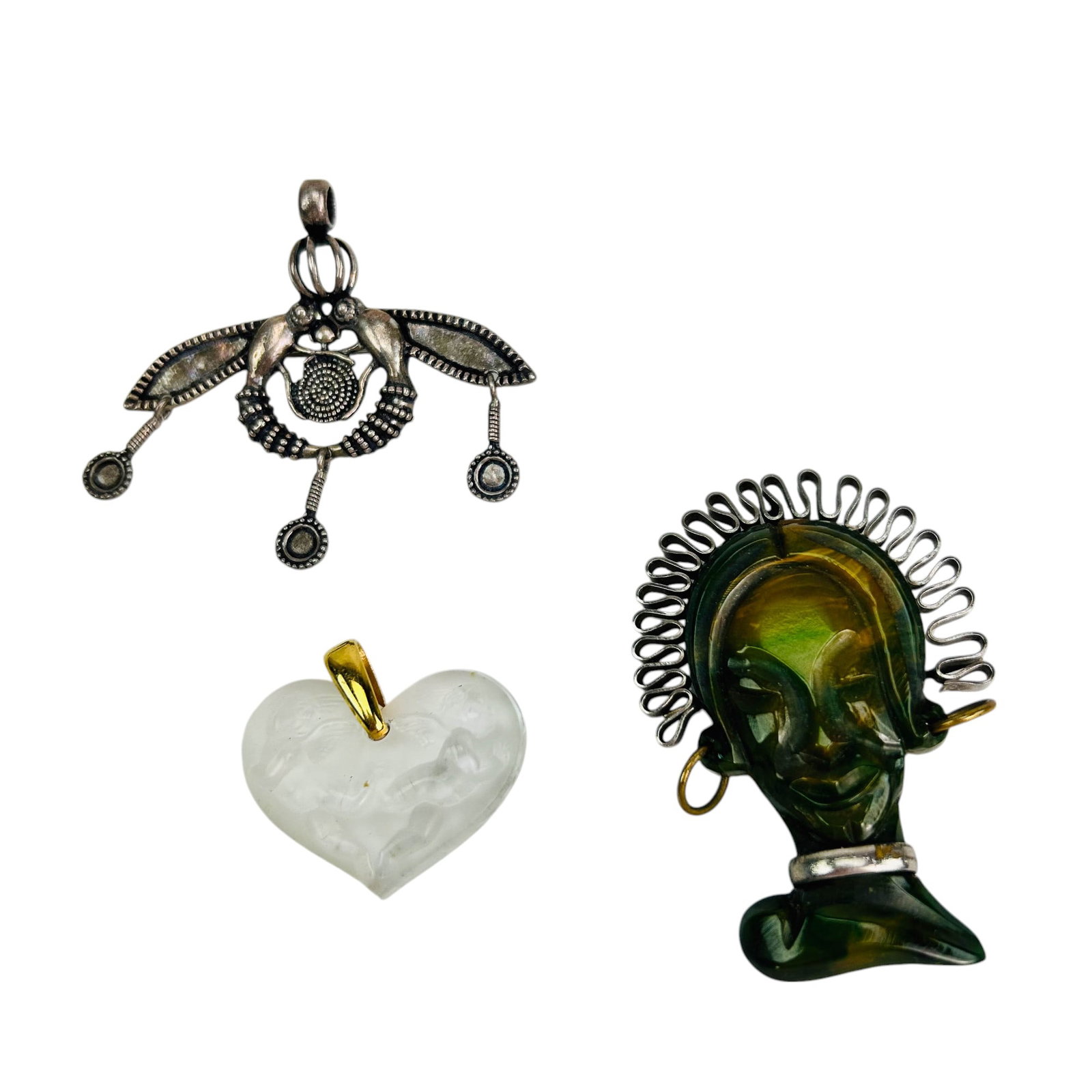 Lalique Pendant Bakelite & Sterling Brooch Pin 3pc: An unique three piece lot of jewelry articles including :A Lalique French crystal heart pendant with a raised relief winged nude cherub angel suspended from a gold tone bale. An Art Deco influenced ba