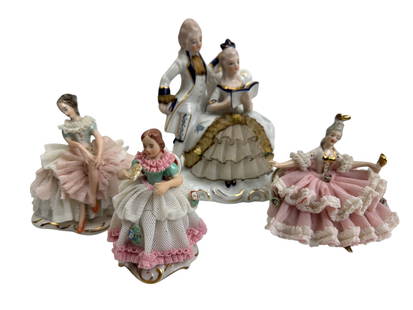 Dresden Porcelain Lace Victorian Lady Figurine LOT: A collection of Dresden and Dresden style porcelain lace lady figurines, crafted with delicate hand applied lace details, finely painted facial features and elegant 18th century-style attire. Each fig