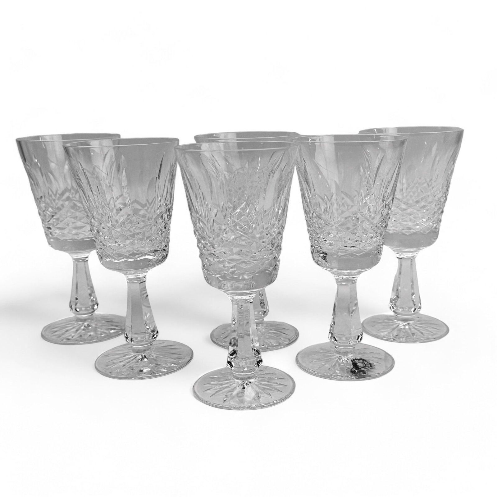 Waterford Crystal Kenmare Claret Wine Goblets 6pc: Manufacturer : Waterford. Country of origin : Ireland. Pattern : Kenmare. Production years : 1962 - 2017. Design feature vertical cuts and oval concaves over a criss cross pattern on the bowl. Tapered