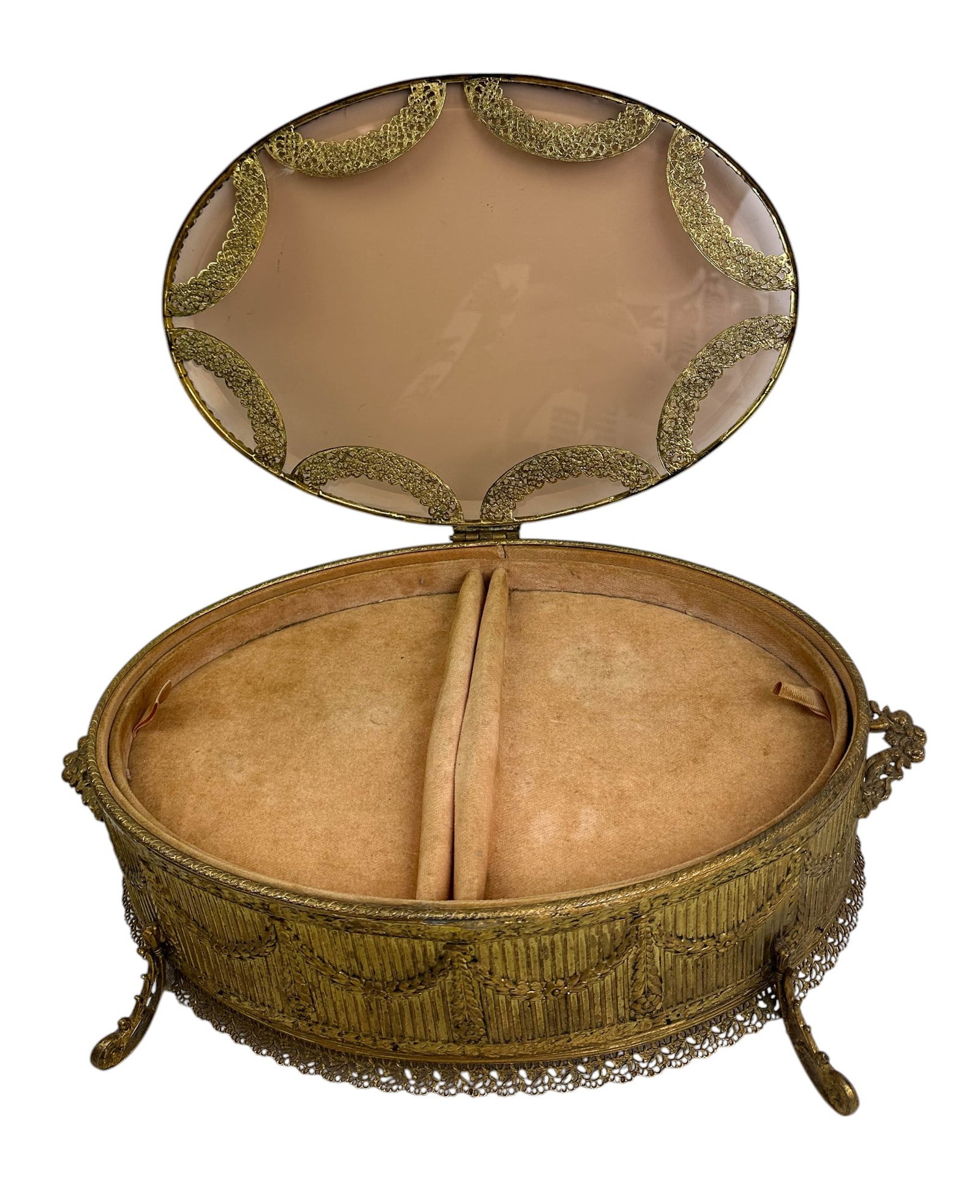 Large French Beveled Glass Jewelry Dresser Box 13": French beveled glass and gilt brass filigree jewelry casket oval dresser box, likely from the late 19th to early 20th century. The oval shaped design with a hinged lid, showcases detailed brass filigr