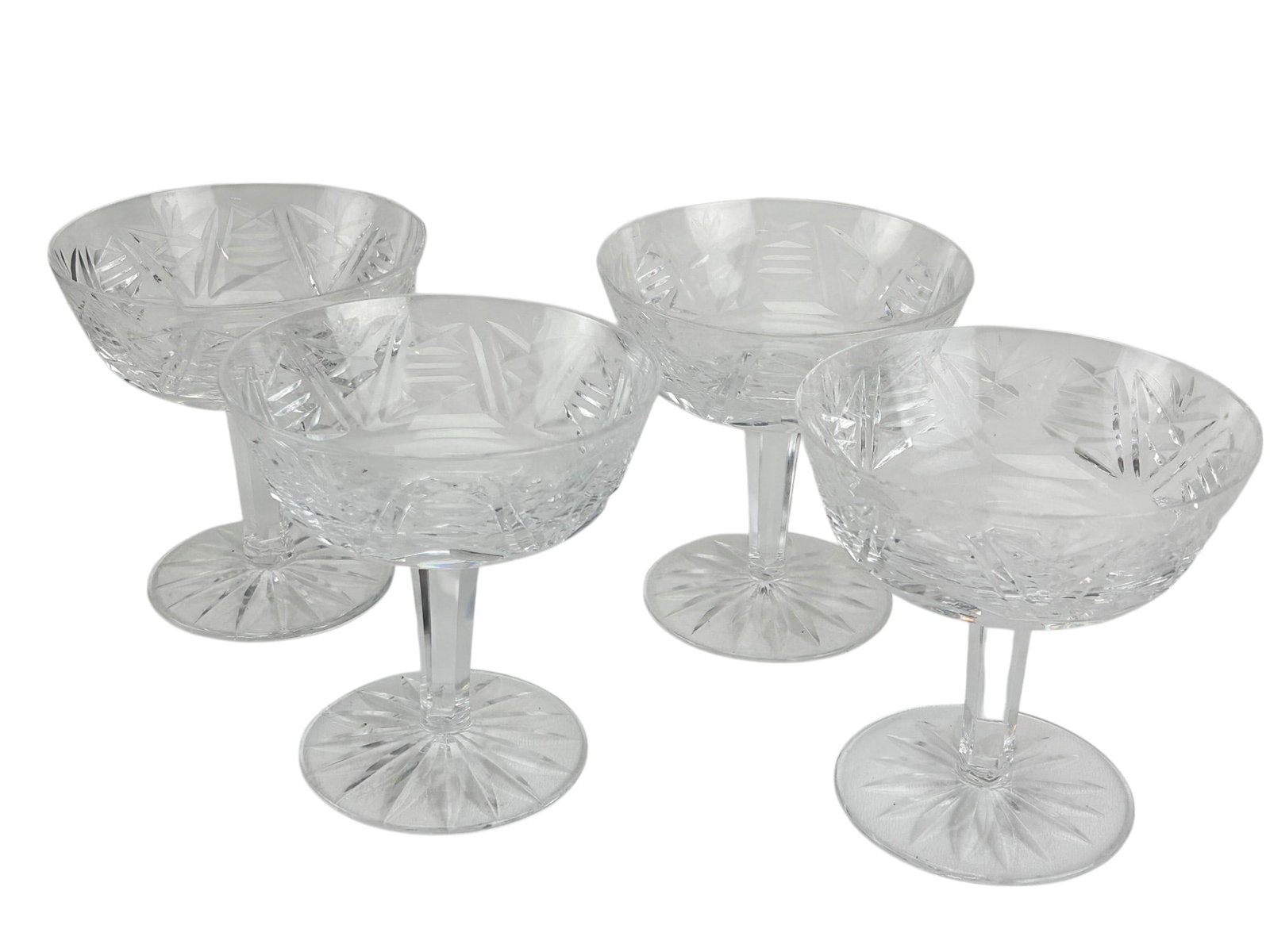 4 Waterford Crystal Clare Barware Liquor Cocktails: Set of four (4) Waterford Ireland crystal art glass bar barware liquor cocktails. Modeled in the Clare pattern introduced in 2000. Design features graduated X stations alternating with ladder back des