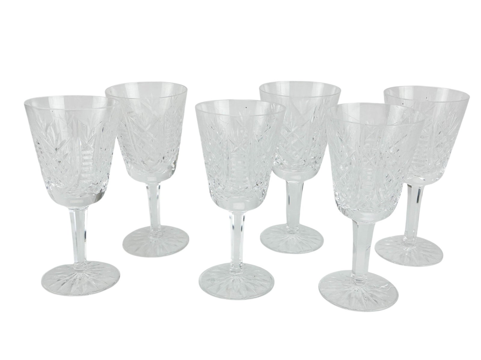 Waterford Crystal Clare White Wine Bar Goblets 6pc: Set of six (6) Waterford Irish cut crsytal art glass bar abrware wine glasses. Modeled in their Clare pattern introduced in 2000. Design features graduated X stations alternating with ladder back desi