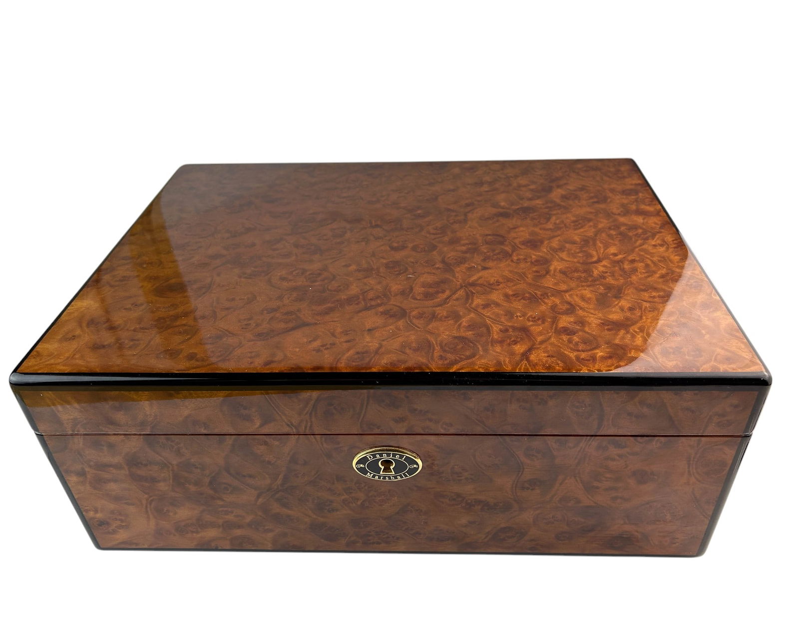 Daniel Marshall Precious Burl Cigar Humidor Box: Daniel Marshall precious burl wooden humidor box having ample storage space within for cigars. From the DM Signature Collection that features 24kt gold plated hinges and locks, Spanish Cedar interior,