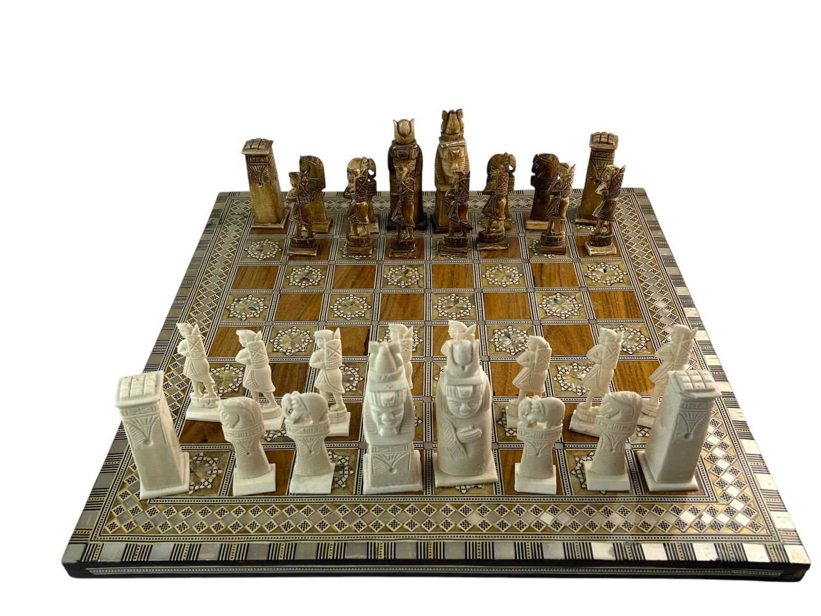 Chess MOP Camel Bone & Wood Inlay Board Game Set: Egyptian themed board game of abstract strategy that features the chessboard that showcases a mother of pearl and wood inlay mosaic pattern in a checkered layout with a decorative border. Pieces inclu