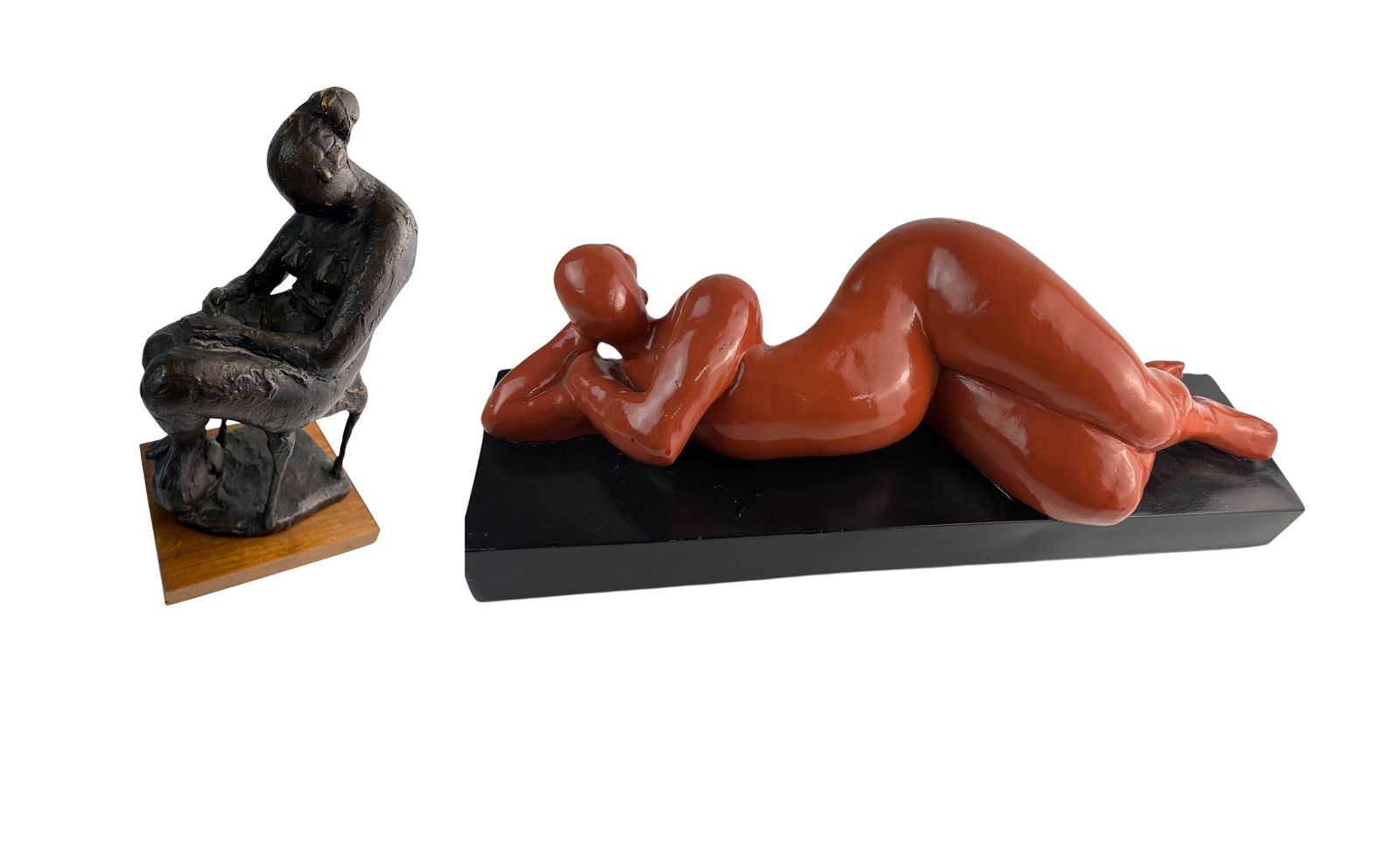 Austin Prod Seated & Reclining Nude Sculpture LOT: Includes ~ An Austin Production ceramic seated nude figure on a chair, with head down, mounted atop a wood base. A ceramic plaster reclining nude on a black colored rectangular base. Measure from 9"-1