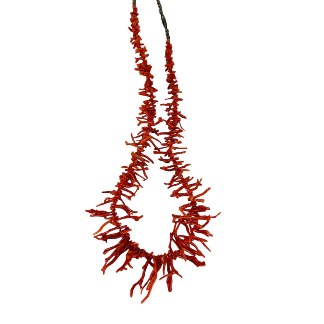 Mediterranean Graduated Branch Red Coral Necklace: Handcrafted single strand necklace composed of deep red Mediterranean style branch coral segments arranged in graduated formation, finished with oxidized silver tone barrel and round spacer beads secu