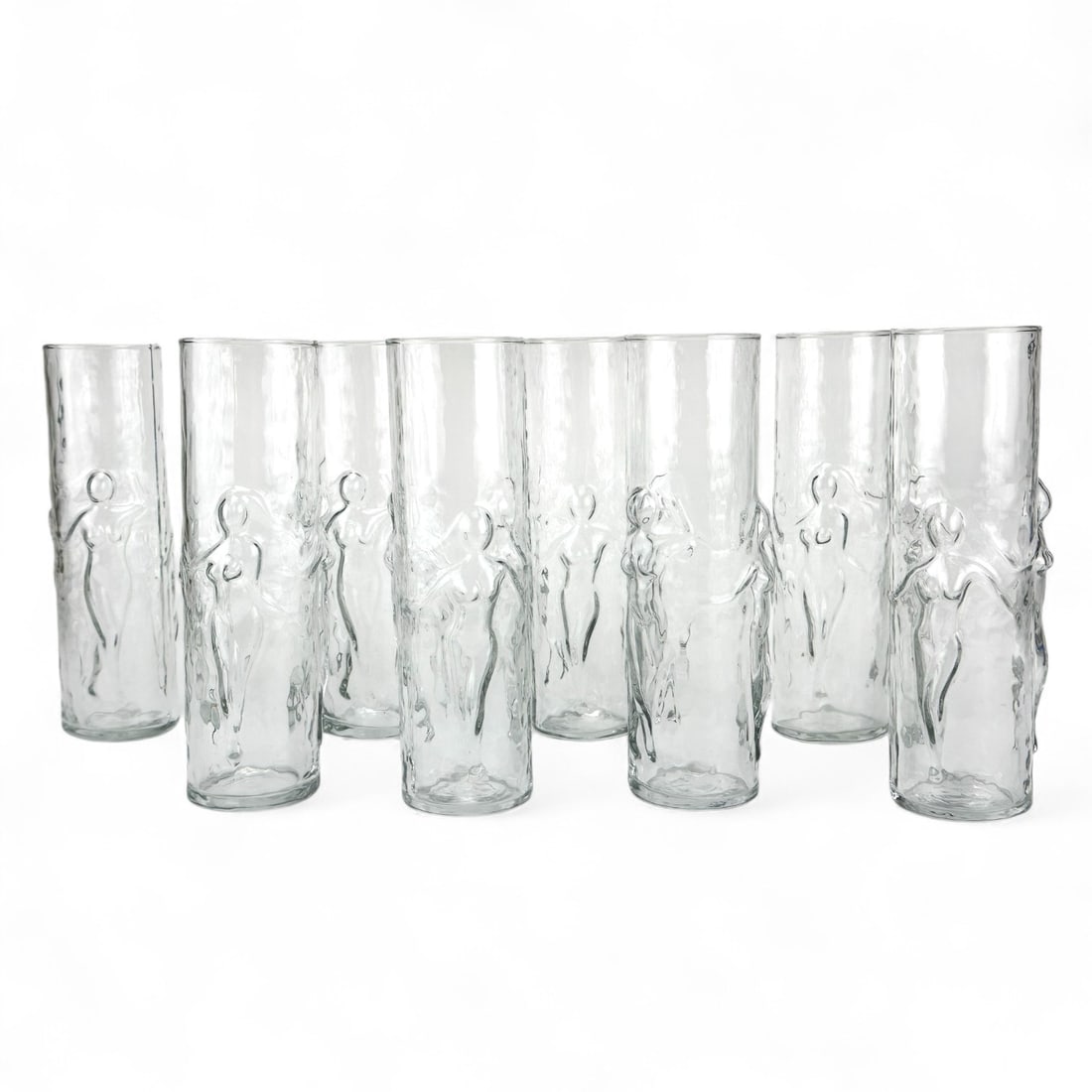 Libbey Glass La Femme Figural Nude Highballs 8pc: Estate lot of eight bar barware clear glass highball coolers by the Libbey Glass Company. Modeled in their La Femme pattern, which is now retired / discontinued. Each cylindrical glass features relief