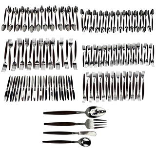 American Tempo Composite Stainless Flatware 144pc: Estate collection of a total of one hundred forty four (144) kitchen cutlery flatware utensils. Late 20th century. Includes ~ Twenty five (25) teaspoons. Nineteen (19) Salad Forks. Twenty three (23) O