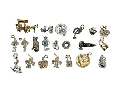Sterling gilt 925 Bracelet Necklace Charm Pendants: Estate collection lot of a total twenty one sterling silver 925 and gilt silver charms, pendants, and small figural pieces. Assortment features crowns, fleur de lis, keys, locks, rocking horse, palm t