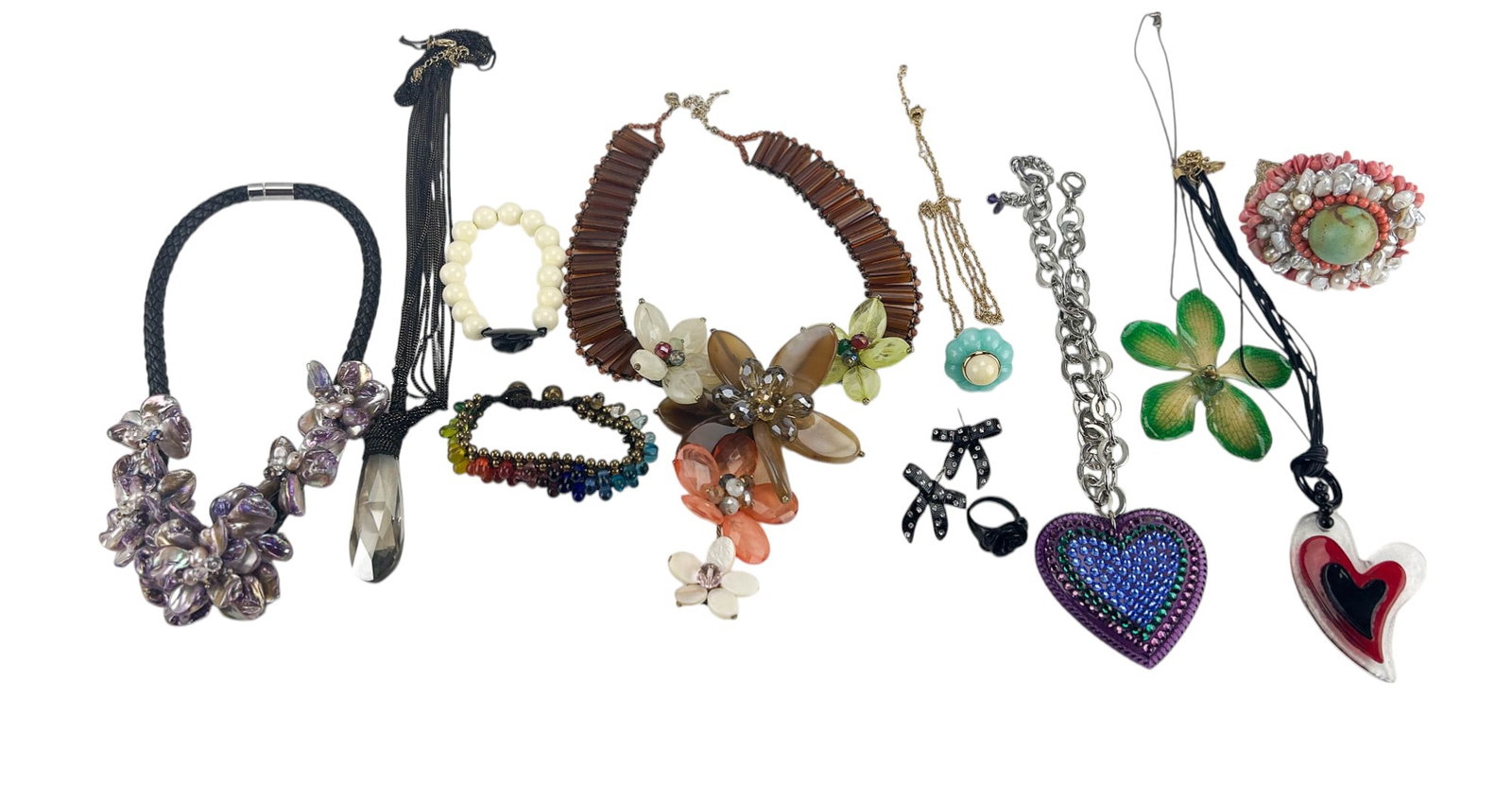 Designer Costume Jewelry Lot of 12 Vintage Pieces: Designer costume jewelry lot of twelve (12) vintage pieces. Lot includes seven (7) necklaces in varying sizes composed of stones, Murano glass, enamel, leather, sterling silver and other materials. Ra