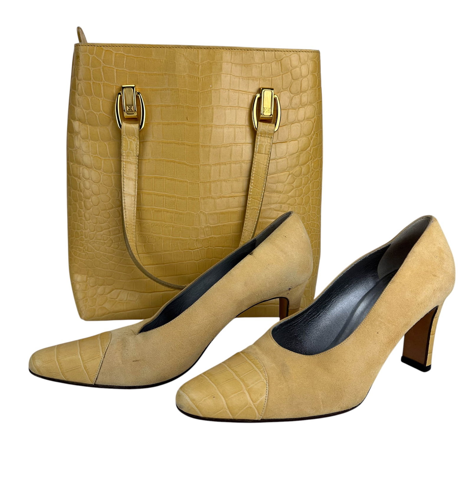 Escada Croc Embossed Leather Tote Purse & Pumps: Escada matched set including a tote bag and pair of pumps. Handbag features crocodile embossed leather, gold tone hardware stamped with the Escada monogram, dual shoulder straps, and a zippered top cl