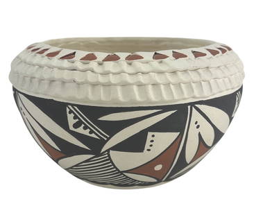 Norma Jean Ortiz Acoma Pueblo Carved Pottery Bowl: Norma Jean Ortiz (Acoma Pueblo, New Mexico) hand coiled pottery bowl with carved and painted traditional Acoma polychrome designs. The bowl features a sculpted rim with alternating terracotta triangul