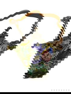 Paul Counts Whimsical Floral Blown Glass Teapot: Paul Allen Counts (American, 20th /21st century) studio hand blown art glass sculptural teapot. Features a carmel hued free form glass handle, with internally cased multicolored millefiori canes and s