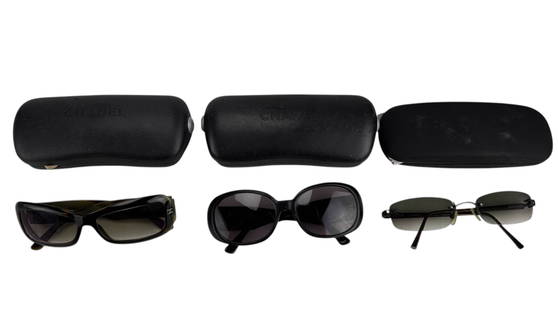 Chanel Luxury Designer Eye Ware Sunglasses 3pc LOT: Chanel grouping of three designer sunglasses. Includes one pair in black plastic with white camellia flower details, model 5113 c.501/87 56?16 130 3N, and one pair in tortoiseshell plastic with quilte