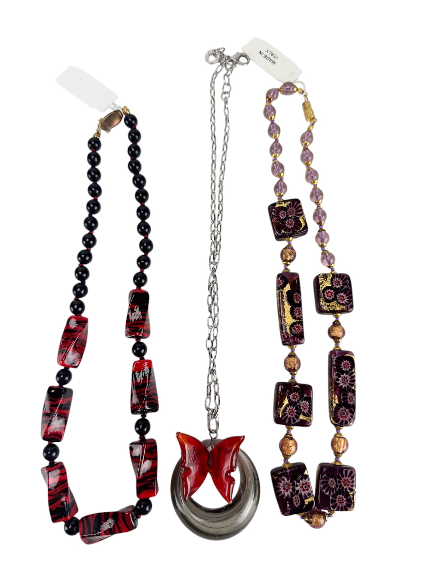 Estate Lot 3 Murano Italy Glass Necklace Jewelry: Estate lot of three (3) Murano Italy glass jewelry pieces. Group includes one (1) Antica Murrina Venezia blown glass pendant on silvertone chain. Pendant is teardrop in shape with reddish orange butte