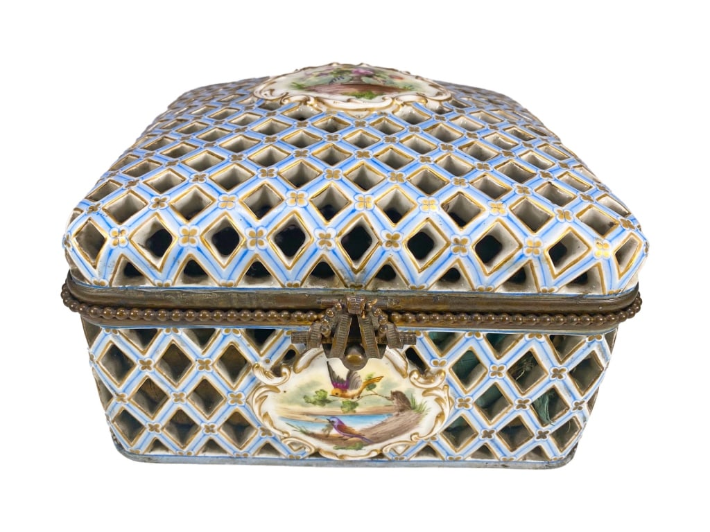 Antique Jacob Petit Porcelain Jewelry Casket Box: Jacob Petit (French, 1796â€“1865), antique 19th century porcelain lattice jewelry casket box with intricate reticulated design and hand-painted blue and gold accents. The lid and front feature ov