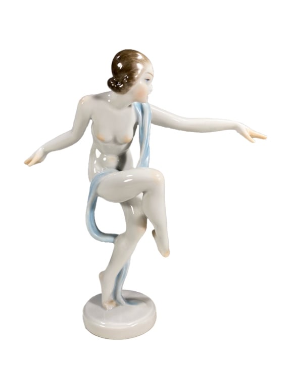 Herend Porcelain HP Nude Woman w/ Scarf Figurine: Herend hand-painted porcelain figurine depicting a nude woman in an elegant, balletic pose with her arms extended. A light blue draped scarf flows around her body and legs, adding movement and contras