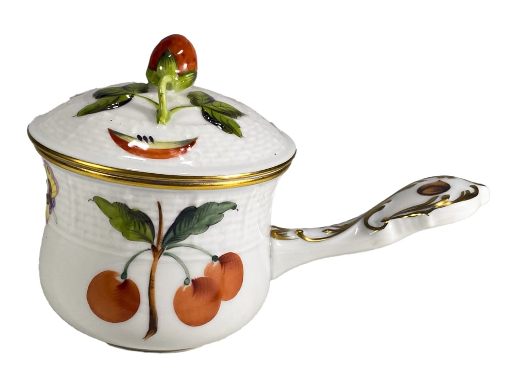 Herend Hungarian Porcelain Fruit Motif Sauce Pot: Herend hand-painted porcelain sauce pot with a cherry fruit motif, butterflies, and floral detailing throughout. The lid is topped with a molded strawberry finial and painted watermelon slice. Marked 