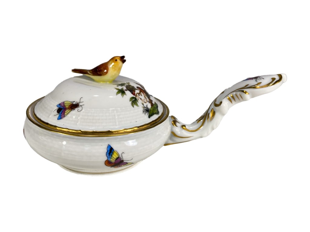 Herend Porcelain Covered Sauce Boat w/ Bird Finial: Herend porcelain sauce boat with an ornate handle, hand-painted with butterflies, birds, and floral accents. The lid features a yellow-brown bird finial as well. Marked with the classic 'Herend Hungar