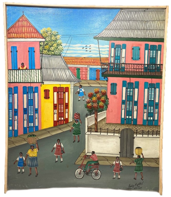 Eddy Myrthil Haitian Street Scene Oil Painting: A vibrant Haitian village street scene oil painting on canvas depicting daily village life, with women carrying baskets, children playing, and colorful colonial houses. Circa: 20th century. Signed to 