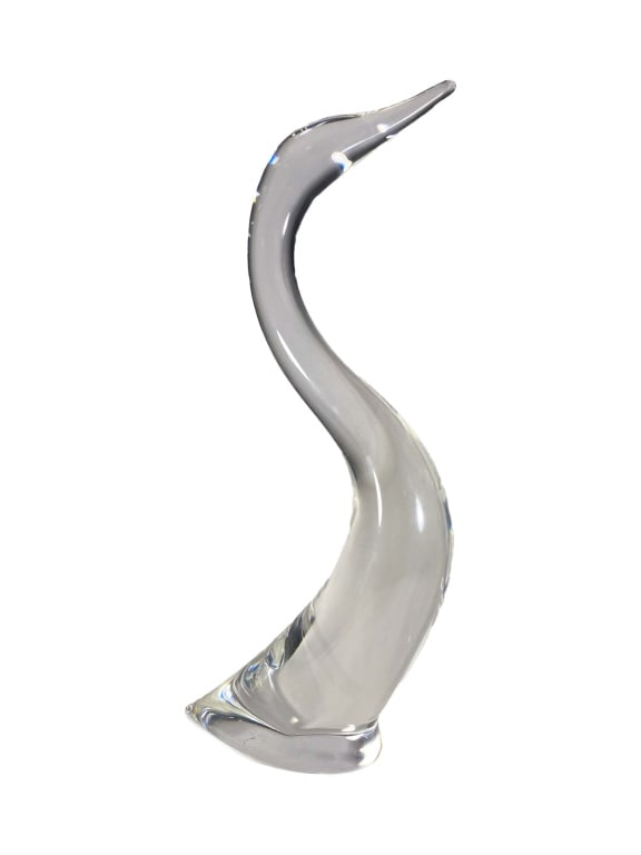 Steuben Clear Crystal Art Glass Heron Sculpture: Steuben American clear crystal art glass figurine of a modernist long-necked Heron bird with a swooping curved neck and pointed beak. Signed 'Steuben' in script on the base.Dimensions: 14.75 X 6 X 2.5