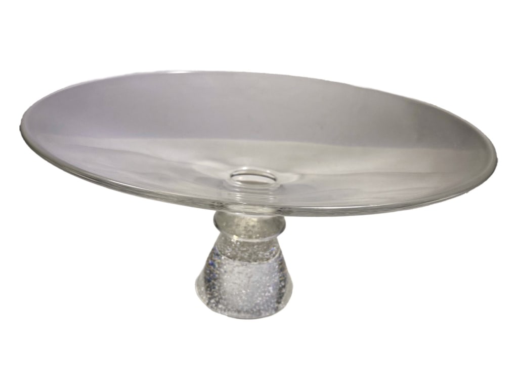 Steuben American Crystal Pedestal Bubble Bowl: Steuben clear crystal shallow bowl raised on a wide conical pedestal with controlled bubble inclusions. Designed in an elegant modernist form with a thin rim and circular footed base. A script-etched