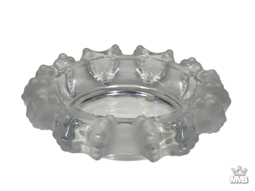 Lalique French Octopus Frosted Crystal Ashtray: Lalique circular crystal ashtray with a frosted octopus tentacle motif around its rim. Clear to center with a smooth polished base. Etched signature 'Lalique France' is present on its base. Dimensions