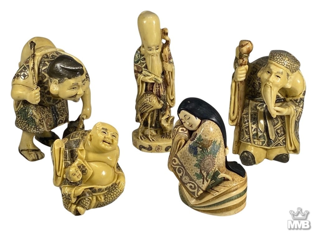 Japanese Carved Natural Material Figurines 5pc LOT: A group of five hand-carved Japanese figurines, each finely detailed with traditional attire, facial expressions, and decorative motifs. The bases are inscribed with Japanese calligraphy. The tallest
