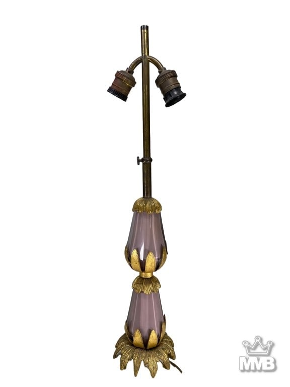 French Amethyst Glass & Gilt Bronze Table Lamp: Elegant French table lamp featuring faceted amethyst color glass sections mounted in bronze foliate mounts. The base and collars are cast in leaf form with a rich gilt finish, supporting a double-sock