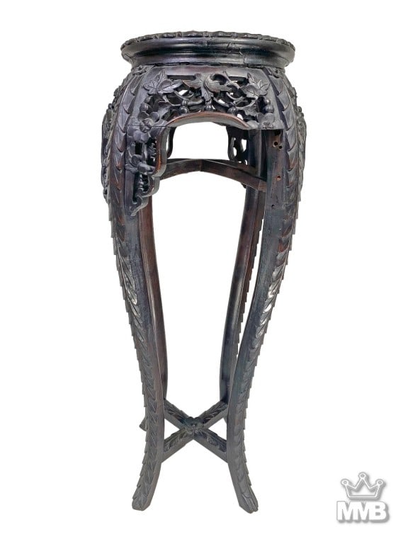 Antique Chinese Carved Wood & Marble Top Pedestal: Antique Chinese carved wooden pedestal stand with an inset marble top. The round top is framed by detailed foliate carvings, supported by four legs with pierced floral and vine motifs, joined by a cro