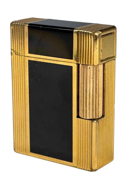 ST Dupont, Paris Laque de Chine Black Lighter: Vintage S.T. Dupont Paris gas lighter in black Laque de Chine with gold-plated ribbed trim. Flip-top with flint wheel. Base stamped 'S.T. Dupont Paris, Made in France, Laque de Chine' with serial numb