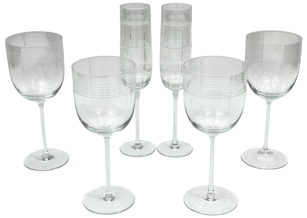 Ralph Lauren Crystal Wine & Champagne Glasses 6pcs: Ralph Lauren lot of six crystal stemware glasses. To include four wine glasses and two champagne flutes. Each base retains 'RALPH LAUREN' etched into the glass. Each wine glass measures approximately