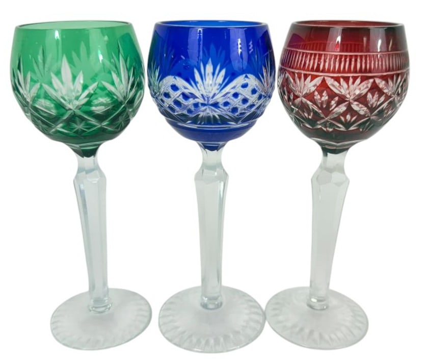 Bohemian Cut Crystal Hock Wine Glasses 3pc SET: Set of three Bohemian Czech cut-to-clear crystal hock small wine glasses, each with faceted stems and deeply cut bowls in forest green, cobalt blue and ruby red. The bowls are decorated with fine diam