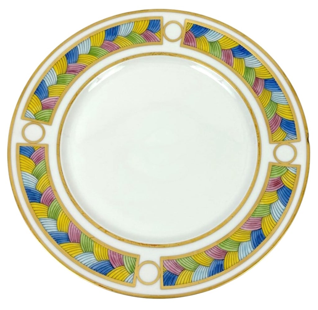 A.F. Danz Puiforcat Limoges Rainbow Dinner Plate: Puiforcat Limoges hand painted French porcelain dinner plate from the 'Rainbow' collection, designed by A.F. Danz. The dish features a multicolor geometric fan motif around the rim, accented with gilt