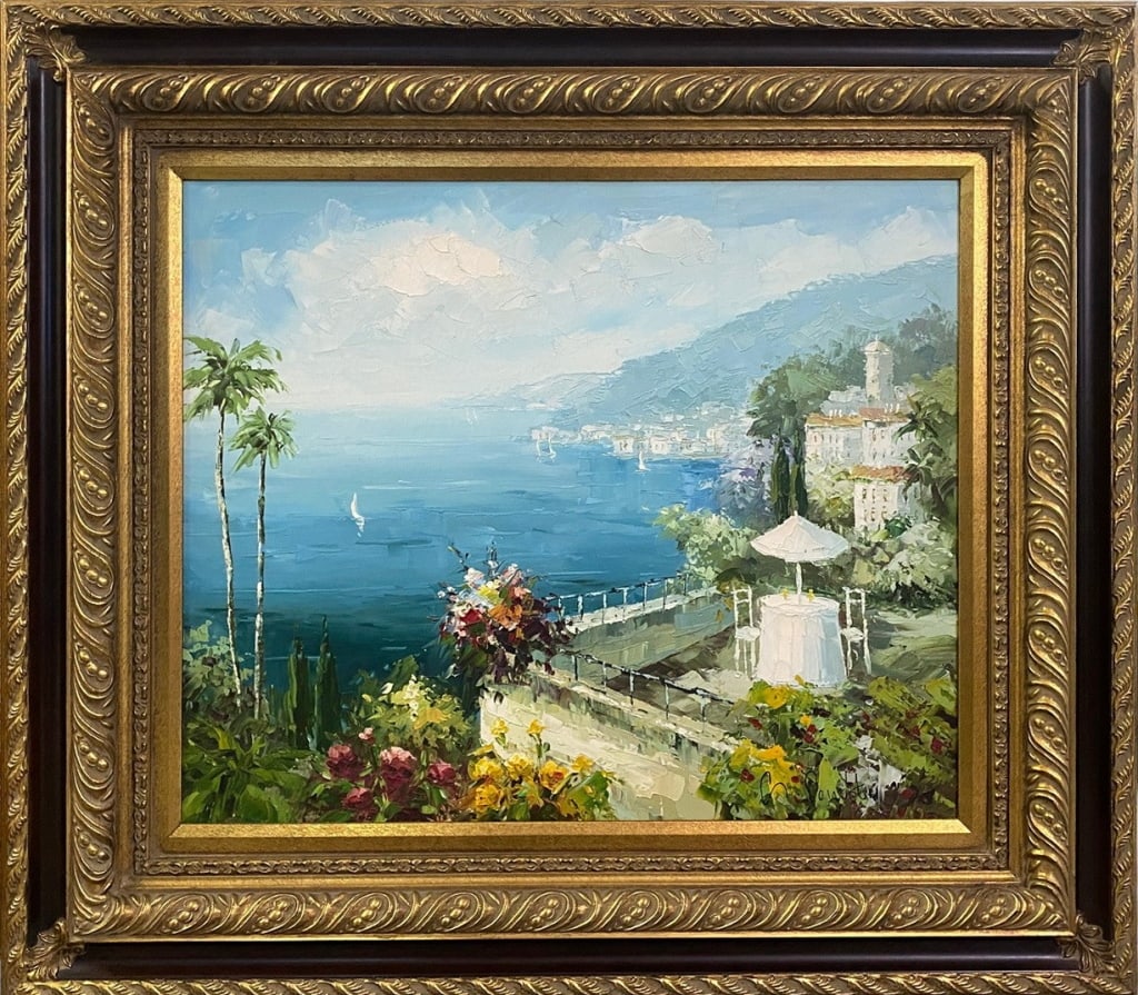 Ponitti Coastal Oil Painting on Canvas SIGNED: Oil on canvas coastal scene depicting a terrace with an umbrella dining table overlooking the sea, with sailboats, a floral garden in the foreground, and a hillside village in the distance. Signed low