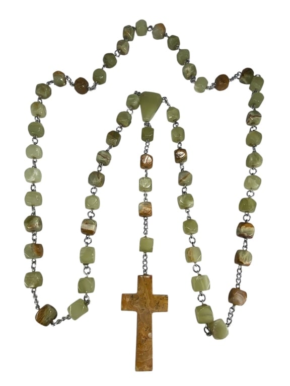 Carved Green Rosary w/ Brown Onyx Crucifix: Rosary with carved green and brown onyx beads linked by metal chain, featuring a polished brown onyx crucifix. Dimensions: 43 X 1.75 X 0.5 in. Condition: Good overall condition having normal surfac