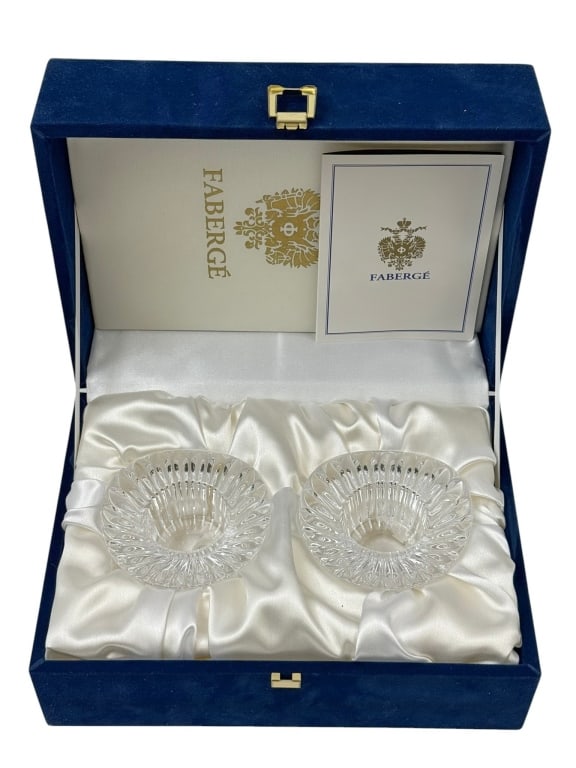 Pair of Faberge Imperial Soleil Cut Crystal Bowls: Faberge Imperial Soleil Oblong Votives pair. Both bowls bear the etched Faberge marks to their base. Comes in their original fitted presentation box. Each piece measures approximately 1.75 inches tall