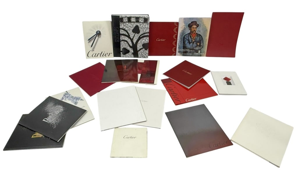 Cartier, Piaget, VCA & Christie's Catalogues 21pcs: Assorted collection of vintage and contemporary fine jewelry designer catalogs, promotional booklets, and exhibition publications. The group mainly consists of softcover catalogues in signature Cartie