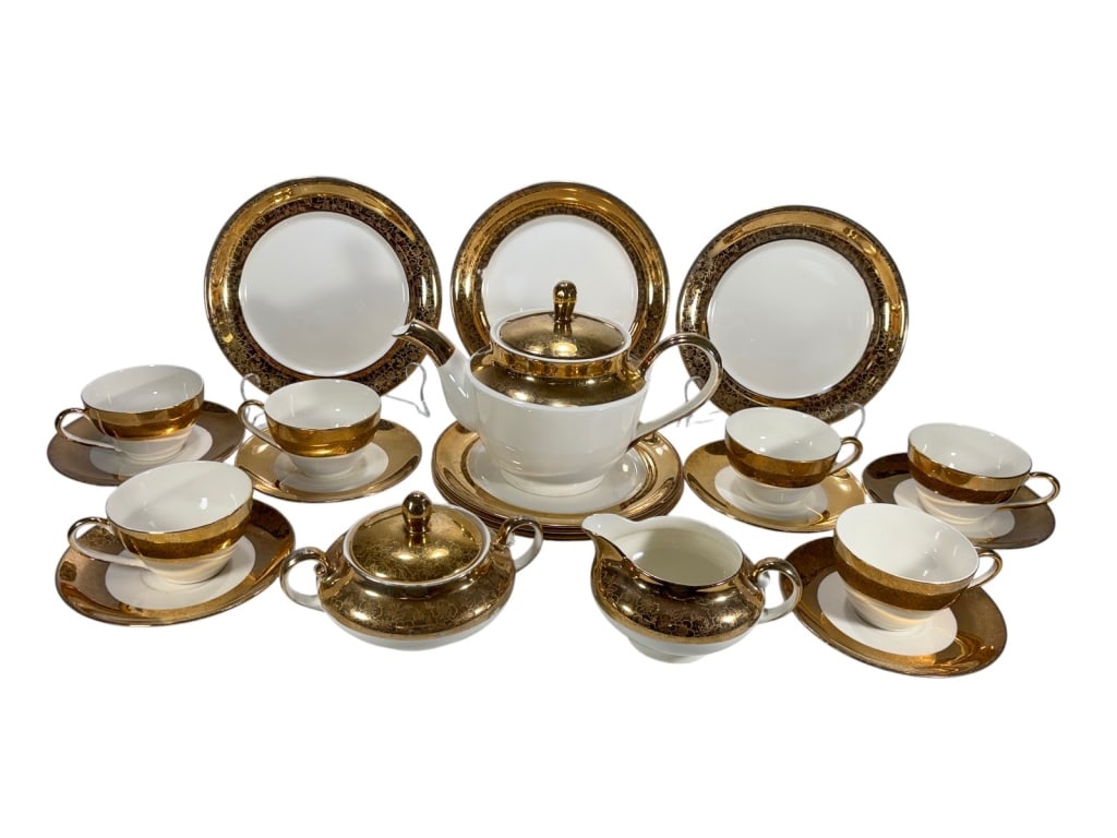King Quality Fine Dinnerware 22 KT Gold 21pc LOT: King Quality Fine Dinnerware 21-piece set with 22kt gold floral decoration. Includes teapot, covered sugar, creamer, cups with saucers, and plates. Each piece marked 'King Quality Fine Dinnerware 22 K