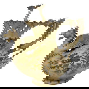 Alfred Stellmacher Teplitz Dragon Porcelain Teapot: Alfred Stellmacher (German, 19th century) Teplitz porcelain teapot featuring a fierce dragon forming the spout and handle with a figural dolphin finial to its lid. The body is finished in a rich