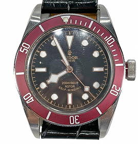 Tudor Geneve Heritage Black Bay Red Dive Watch: Tudor Geneve Heritage Black Bay automatic dive watch, model 79220, with burgundy bezel, black dial, and luminous markers, engraved caseback, and later black Patek Philippe leather strap. The watch cas