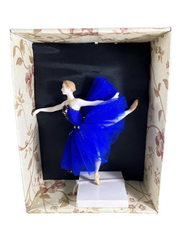 Olga Alexeeva Russian Dancer Porcelain Toy: Unglazed porcelain ballerina figurine by Olga Alexeeva, St. Petersburg, from the 'Russian Ballet' collection, wearing a cobalt-blue tulle costume with bead accents in a floral box. The figurine measur