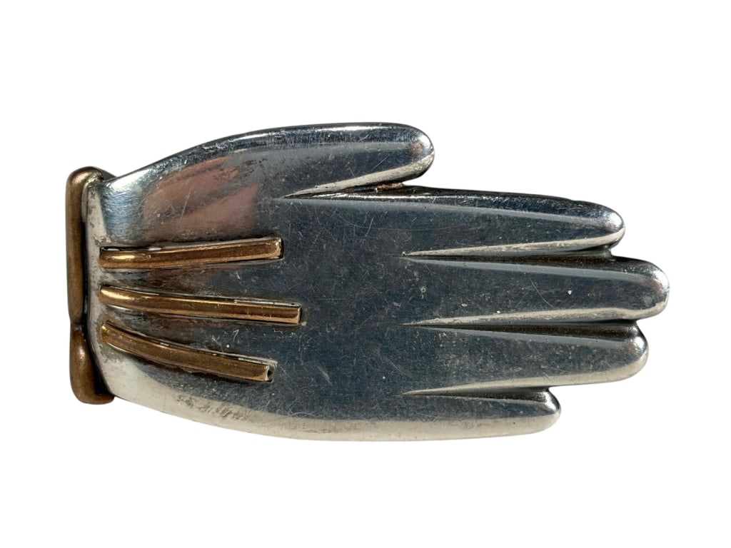 VTG Sterling 925 Hand Paper Clip Marked WD: Sterling silver spring clip shaped as a stylized hand with gilt-bronze details, thumb lever, and spring hinge, marked '925.'Dimensions: 1.875 X 1 X 0.5 in. Condition: Good overall condition having